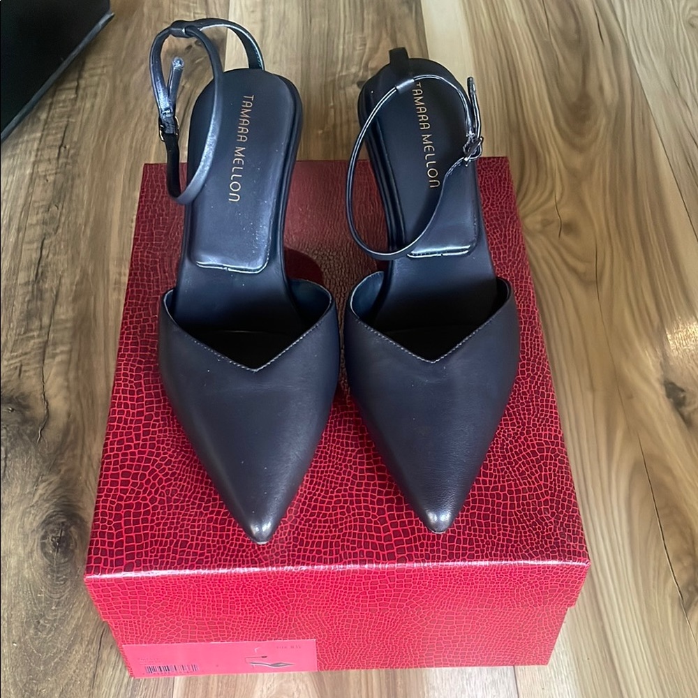 Tamara Mellon Black Women's strappy pumps.